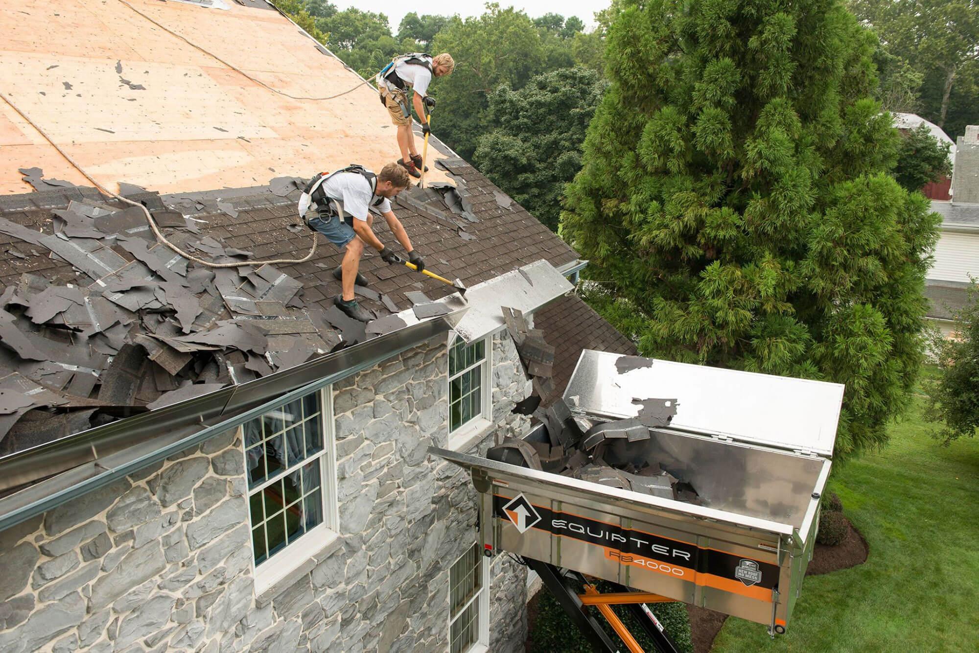 Photo of people working on roof using Equipter 4000