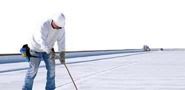 Worker applies an insulation coating on the concrete surface of a rooftop. Repairman fixing a leaking roof or deck by applying waterproofing solution