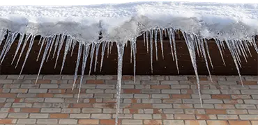 icicles hanging from a roof