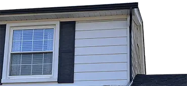 Seamless black gutters on a home