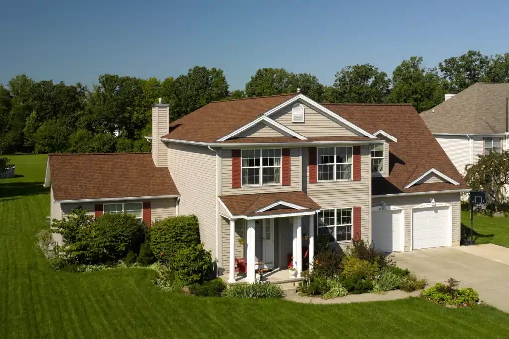 A two-story home with Landmark PRO designer shingles