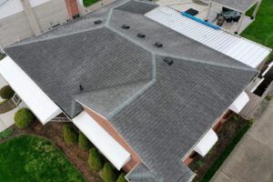 Birds eye view of house with new roof