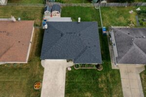 Birds eye view of house with new roof