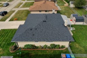 Birds eye view of house with new roof