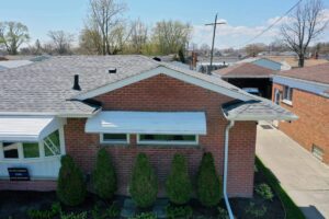 Birds eye view of house with new roof
