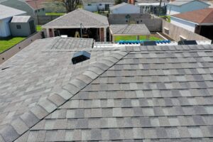 Birds eye view of house with new roof