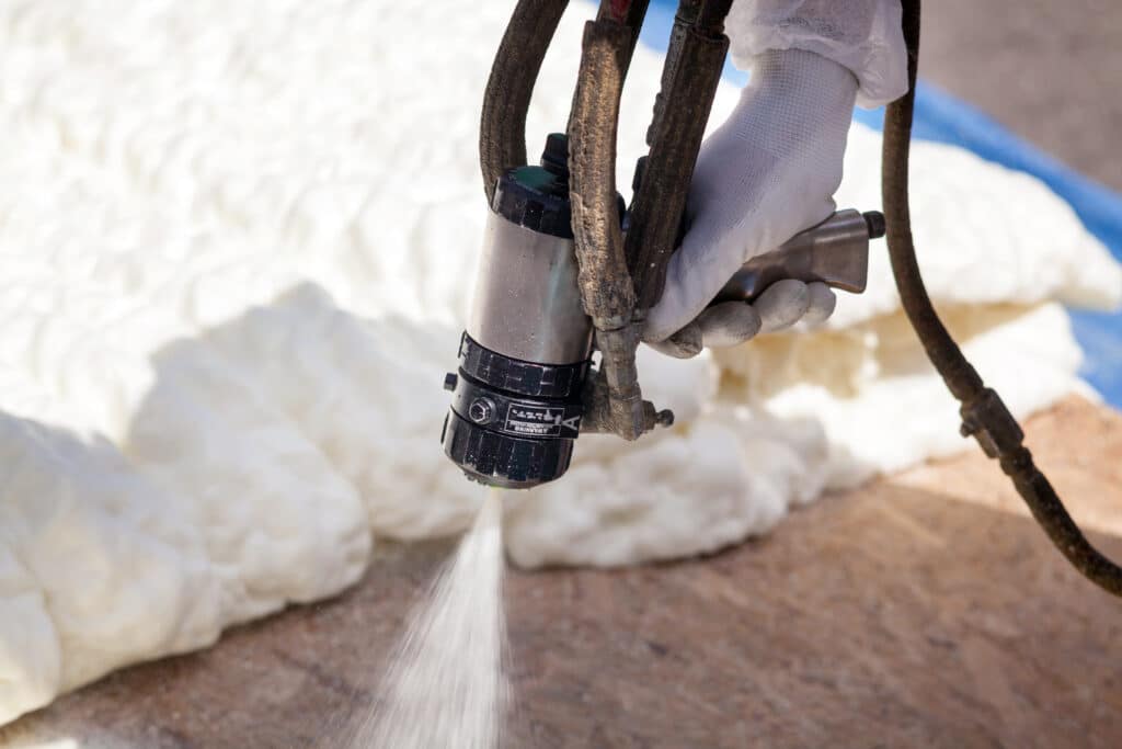 Foam insulation being sprayed