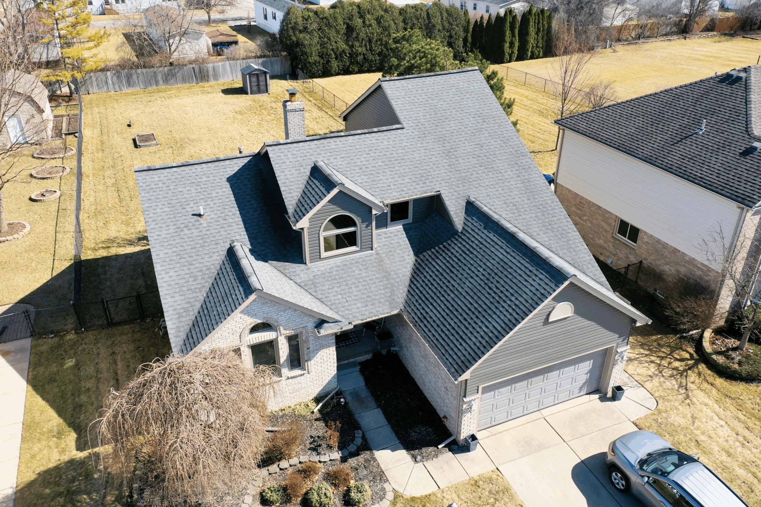 A newly transformed home with updated roofing and siding