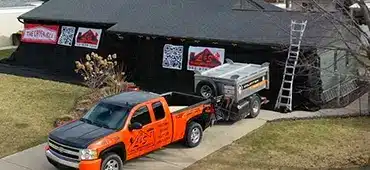 Drone view of a new black roof on a home