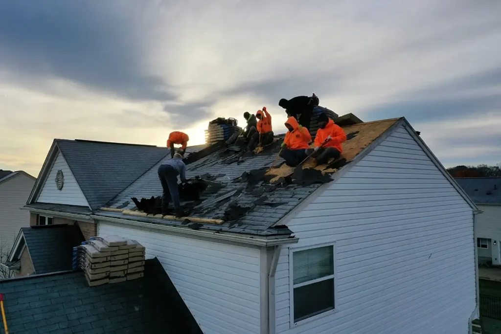 Done view of L&S Home Improvements workers installing a new roof on a home