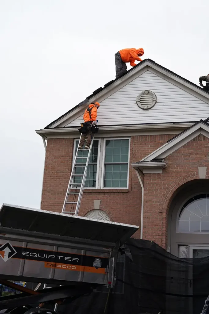 L&S Home Improvements workers installing a new roof on a home