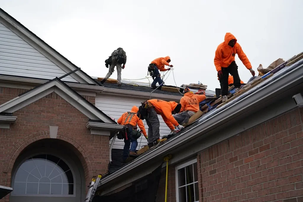 L&S Home Improvements workers installing a new roof on a home