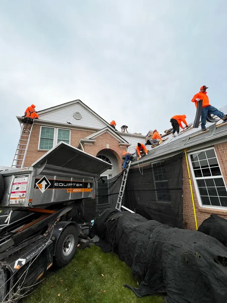 L&S Home Improvements workers installing a new roof on a home