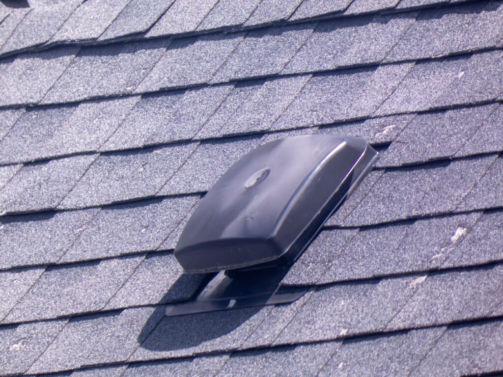A smart vent on a newly installed roof