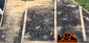 Rotted wood deck with L&S's logo in the corner